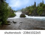 Lake Clark National Park in Alaska. Tanalian Falls and river. Spruce trees, rugged mountains and popular day hike area near Port Alsworth.