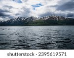 Lake Clark National Park, Alaska. Chigmit Mountains as seen from water on Lake Clark. Remote wilderness with rugged mountains and alpine lake. Alaska National Interest Lands Conservation Act (ANILCA)