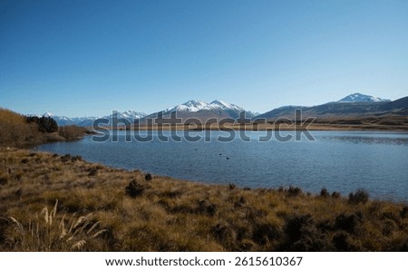 Lake Clearwater idyllic remote rural countryside Southern Alps mountains winter landscape at Ashburton Lakes Canterbury South Island New Zealand