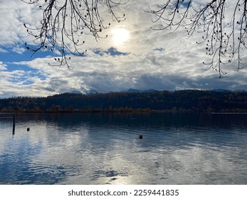 Lake , cloud reflection of sun