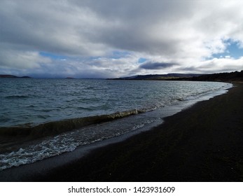 Lake þingvallavatn And Cloudy Sky