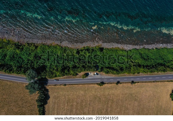 Lake coastline street\
road, drone cars