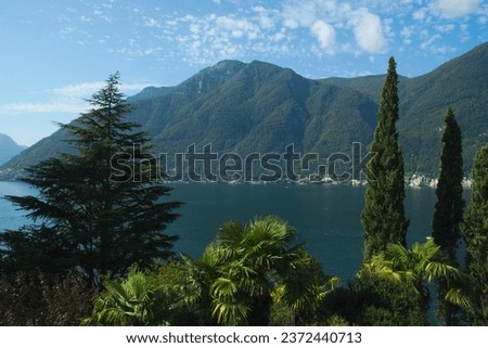 Image, Stock Photo I see a lake with dramatic clouds and trees reflected in the water