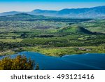 Lake and conic hill at Golan Heights
