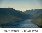 Lake Crescent Stretches into Tree Covered Mountain Slopes in Olympic National Park