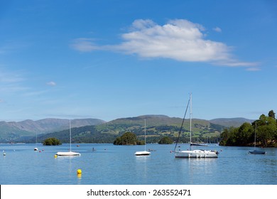 Lake District Scene Bowness On Windermere The Lakes Cumbria UK On A Beautiful Summer Day With Blue Sky Mountains And Sailing Boats