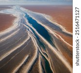 Lake Eyre, also known as Kati Thanda, is the largest salt lake in Australia, located in the remote deserts of South Australia. It sits in a vast, arid basin and only fills with water occasionally.