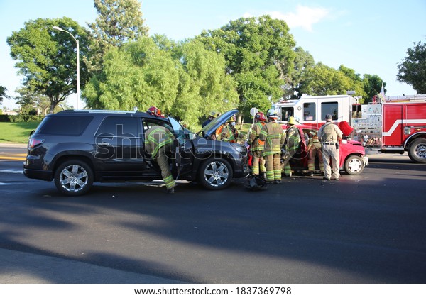 Lake Forest, CA / USA - October 19, 2020: Two
Car Collision with Three People Transported to hospitals. Police,
Fire, and Ambulances respond to a Two Car, Injury Accident in Lake
Forest CA. EDITORIAL
