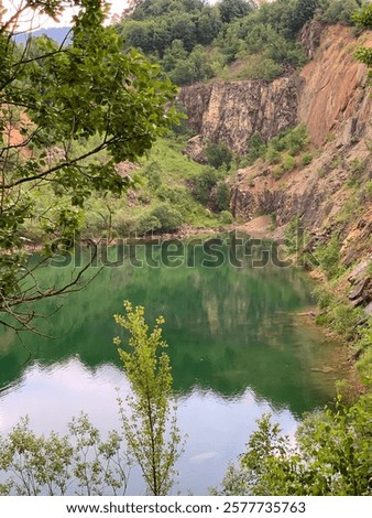Lake Beňatina is a former flooded quarry located in Slovakia in the cadastre of the village of Beňatina, district of Sobrance.