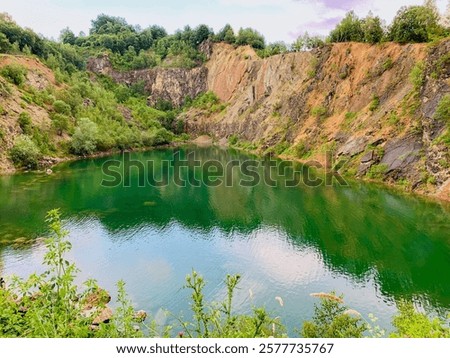 Lake Beňatina is a former flooded quarry located in Slovakia in the cadastre of the village of Beňatina, district of Sobrance.