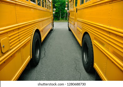 lake george, new york, june 2011, two yellow school buses