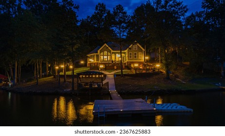 Lake House Lit up at Night