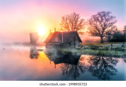 Lake house in the morning fog. Early morning fog on lake house. Lake house in morning fog. Lake house at dawn
