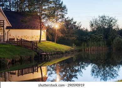 Lake House With Sunset Lights