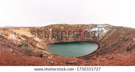 Lake Kerid is a crater lake or volcanic lake, in the crater of a volcano in Iceland. Unusual red soil, similar to the Martian landscapes.