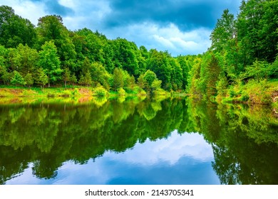 Lake Landscape In Spring. Summer Landscape On The Lake In The Lush Forest. Beautiful Reflection Scene In The Lake Surrounded By Green Trees. Nature Background Theme. Turkey's Magnificent Nature.