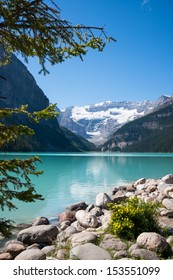 Lake Louise and Mount Victoria with its Glacier, Alberta, Canada. Vertical. Copy space.