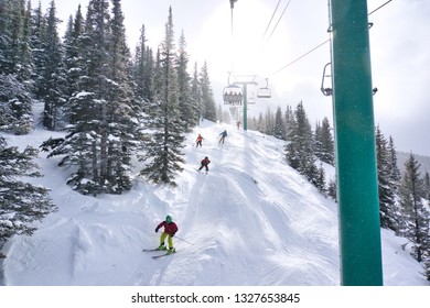 Lake Louise Ski Resort. Lake Louise. Banff. Alberta. Canada. Feb 24 2019.  View From The Larch Express Quad Where A Family Below Was Navigating The Moguls With Style.