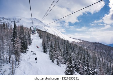 Lake Louise Ski Resort. Lake Louise. Banff. Alberta. Canada. Feb 24 2019.  View From The Larch Express Quad Where A Family Below Was Navigating The Moguls With Style.