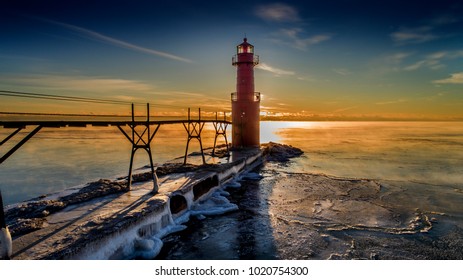 Lake Michigan Lighthouse With A Frozen Morning Sunrise