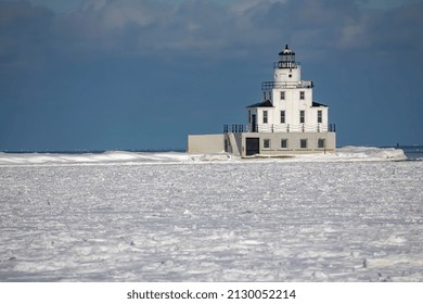 Lake Michigan Lighthouse And The Frozen Mouth Of The Manitowoc River