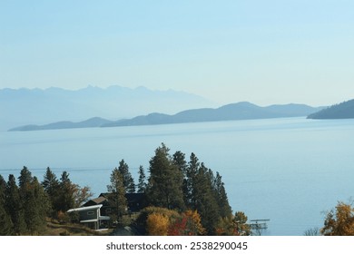 Lake with mist and mountains - Powered by Shutterstock