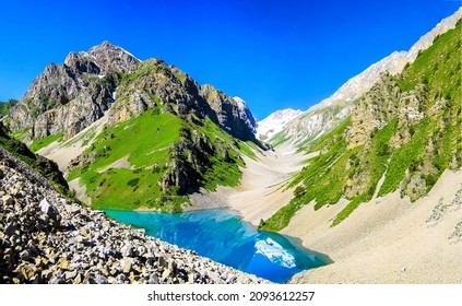 Lake in a mountain hollow. Beautiful blue lake in montains