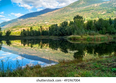 Lake and mountain with reflection in a sunny day