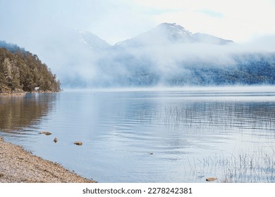 Lake in the mountains Andes winter, Patagonia - APRIL 20, 2022: Nahuel Huapi San Carlos de Bariloche is the capital of Rio Negro province in Argentina  - Shutterstock ID 2278242381