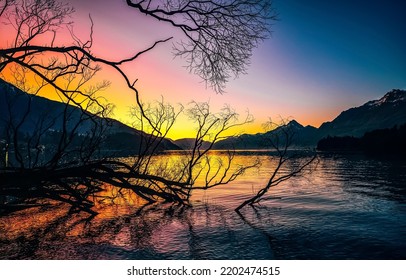 Lake in the mountains at dawn. Mountain lake at dawn. Sunrise over mountain lake. Lake in mountains at dawn - Shutterstock ID 2202474515