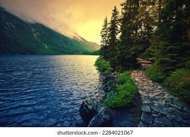 Lake in mountains. Fantasy and colorfull nature landscape. Morskie Oko lake. - Shutterstock ID 2284021067