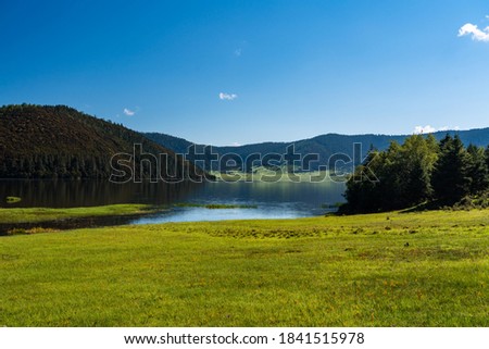 lake in moutains with blue sky
