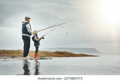 Lake, nature and grandfather fishing with a child learning on an adventure, holiday or weekend trip. Hobby, outdoor and elderly man teaching kid to catch fish on a vacation by a river with mockup - Powered by Shutterstock