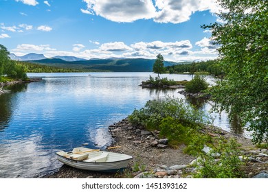 A Lake In Northern Sweden Located In Fatmomakke Along The Wilderness Road