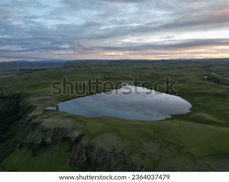 Lake on top of a mountain in Iceland. Aerial photo of Icelandic lake.