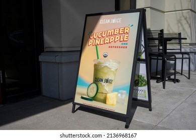 Lake Oswego, OR, USA - Mar 11, 2022: A Sidewalk A-frame Advertising Sign Is Seen Outside The Clean Juice, An Organic Juice Bar And Food Store In Lake Oswego, Oregon.