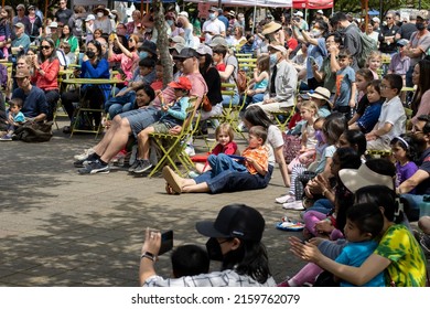 Lake Oswego, OR, USA - May 22, 2022: The Audience At The Asian American And Pacific Islander Heritage Month Celebration Held In Millennium Plaza Park In Lake Oswego, Oregon.