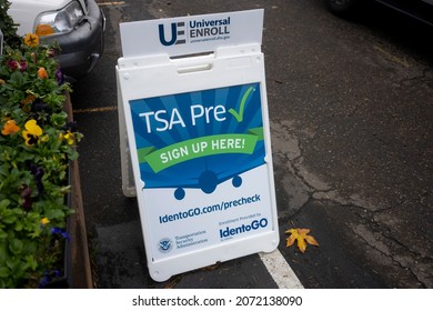 Lake Oswego, OR, USA - Nov 2, 2021: A Sign That Advertises The TSA PreCheck Enrollment Service Is Seen Outside An IdentoGO Office. IdentoGO By IDEMIA Provides Identity-related Services.