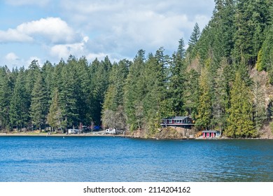 Lake Overview With Camp Ground And Water Front Residential House