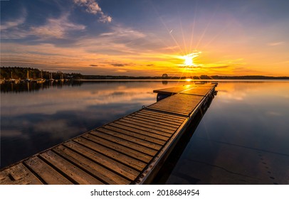 Lake pier at lighting sundown