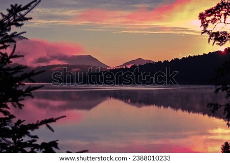 Lake Placid, New York, USA-August 23, 2023:  Sunset on Lake Placid