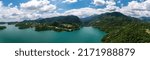 Lake Plastiras, Greece Panoramic aerial view, blue sky with clouds. Also called Tavropos Reservoir is an artificial lake fed by Megdovas river in Karditsa, Thessaly.