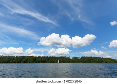 Lake In Polish Masuria On A Sunny Day. Picturesque Cloudy Sky, Masurian Lakeland, Poland