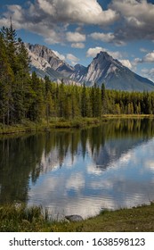 A lake reflection in front of The Rocky Mountains in Kananaskis Country, Alberta, Canada