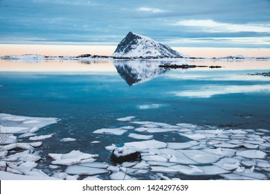 Lake And Reflections In The Artic