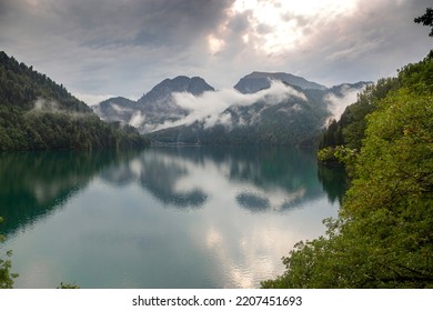 Lake Ritsa In Caucasus Mountains