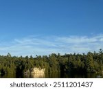 Lake rock formation with canoer 