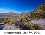 Lake Rodway situated near Scott Kilvert Memorial Hut on a warm autumn morning in Cradle Mountain, Tasmania, Australia