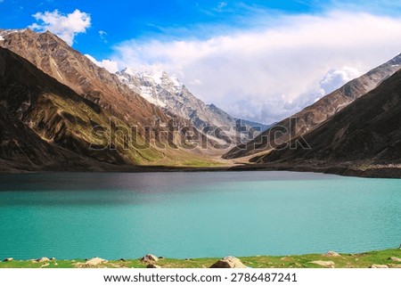 Lake Saif-ul-Malook (also spelled Saiful Muluk or Jheel Saif ul Malook) is one of the most famous and picturesque alpine lakes in Pakistan.
It is located in the Kaghan Valley, near the town of Naran in the Mansehra District of Khyber Pakhtunkhwa province.

Jheel, Pound Saif-ul-Malook is widely regarded as one of Pakistan’s top natural attractions, combining raw Himalayan beauty with rich folklore. It’s a must-visit for nature lovers, photographers, and adventurers exploring the Kaghan.

Key Facts
Elevation: 3,224 meters (10,577–10,578 feet) above sea level.
Location: About 8–9 km north of Naran, at the northern end of the Kaghan, inside Saiful Muluk National Park.
It lies above the tree line, surrounded by snow-capped peaks, including the prominent Malika Parbat.

Size and Features:
It has an oval shape, roughly a mile across, with crystal-clear turquoise waters fed by glacial melt.
The maximum depth is reported around 113 meters in some sources.

Stunning reflections of the surrounding mountains and dramatic scenery and blue color water.
This romantic tale makes the lake a symbol of magical beauty in Pakistani culture.

How to Reach
From Naran: The most common way is a thrilling 40–60 minute jeep ride on a rugged, bumpy mountain track (about 8–9 km one way).
You can also trek it (2–3 hours one way), which is scenic but demanding.
 visitsilkroad.org
Naran is reachable by road from Islamabad (around 250–300 km via Mansehra and the Kaghan Valley road). The nearest major airport is in Islamabad.
Best Time to Visit: June to September (summer).
The road is usually open then, with pleasant weather, green meadows, and accessible views. Winters bring heavy snow, closing access, and the lake may freeze.

Enjoy the breathtaking views and photography, boat ride, (weather permitting), Short walks around the view and nearby glaciers. Experience the serene, high-altitude environment.