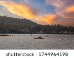 LAKE SAMMAMISH IN ISSAQUAH WASHINGTON AT SUNSET WITH A BRIGHT SUNSET